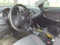Mitsubishi Lancer 2010 AT White Sedan For Sale -2