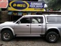 L200 Strada 4wd Turbo diesel Mitsubishi pick up 2002 camper shell-1