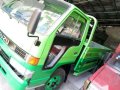 Isuzu Elf Dropside-1