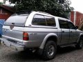 L200 Strada 4wd Turbo diesel Mitsubishi pick up 2002 camper shell-3