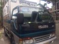 Isuzu Elf 2000 14ft MT Green Truck For Sale -0