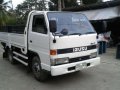 Isuzu Elf Dropside 11.5ft MT White For Sale -1