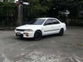 Mazda 323 Rayban Glxi 1996 MT White For Sale -0