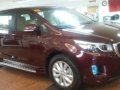 On hand stocks of kia grand carnival11 7str huryup beat the excise tax-1