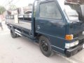 Isuzu elf NKR dropside 4be1-7