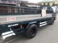 Isuzu elf NKR dropside 4be1-2