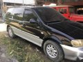 Kia Carnival Van 1998 MT Black For Sale -1