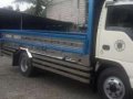 Isuzu Elf 4HE1 15ft MT White Truck For Sale -1