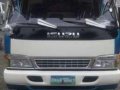 Isuzu Elf 4HE1 15ft MT White Truck For Sale -0