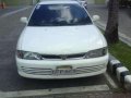 White Car-Mitsubishi Lancer 1995 mdl for sale -0