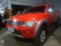 2013 Mitsubishi Strada 4x4 AT Red Pickup For Sale -0