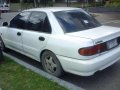White Car-Mitsubishi Lancer 1995 mdl for sale -1
