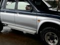 Mitsubishi strada orig manual 4x4 working-1