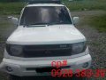 Mitsubishi Pajero iO 2004 4x4 MT White For Sale -0