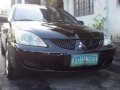 For sale Mitsubishi Lancer black 2006-0