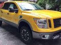 2017 Nissan Titan XD 4x4 AT Yellow Truck For Sale -0