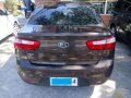 2012 Kia Rio 1.4 EX Sedan Automatic Brown For Sale -1