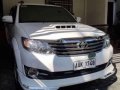 Toyota Fortuner G 2014 MT 4x2 2.5 MT White For Sale -4