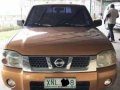 Nissan Frontier Titanium 2003 Orange For Sale -1