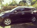 Hyundai Tucson 2010 CRDi 4WD AT Black For Sale -2