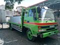 Isuzu Forward Dropside 19ft MT Green For Sale -1