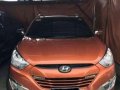 Hyundai Tucson GLS 2013 AT Orange For Sale -4