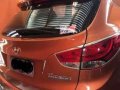 Hyundai Tucson GLS 2013 AT Orange For Sale -8