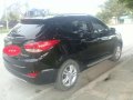 Hyundai Tucson 2013 AT Black SUV For Sale -2