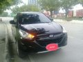 Hyundai Tucson 2013 AT Black SUV For Sale -0