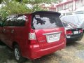 For sale red Toyota Innova-3