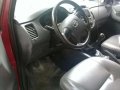 For sale red Toyota Innova-4