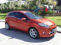 Fresh 2012 Ford Fiesta S AT Orange For Sale -0