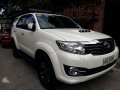 Toyota Fortuner V 4x4 2015 AT White For Sale -0