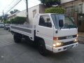 Isuzu ELF Dropside NKR 14ft White For Sale -0