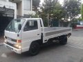 Isuzu ELF Dropside NKR 14ft White For Sale -1