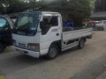 Isuzu Elf Dropside 2014 12ft White For Sale -0