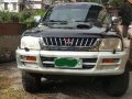 2001 Mitsubishi L200 Strada 4x4 Black For Sale -0