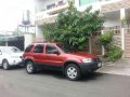 2004 Ford Escape XLS AT Red SUV For Sale -0