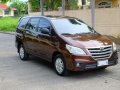 2014 Toyota Innova E MT Brown SUV For Sale -0