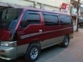 FOR SALE RED Nissan Urvan 2004-0