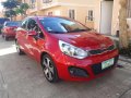 Well-maintained Kia Rio Hatchback 2012 AT for sale-0