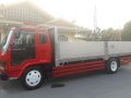 Isuzu Forward Dropside 21ft 6HE1 Red For Sale -1