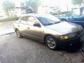Mazda 323 Rayban Gen 2.5 MT Brown For Sale -1