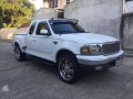 Ford F150 Lariat 4x4 2001 AT White Pickup For Sale -0
