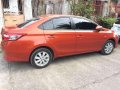 2015 Toyota Vios E AT Orange Sedan For Sale -1