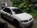 Mazda 323 1997 Gasoline Automatic White for sale -1