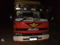 FOR SALE RED Isuzu Elf 14ft-3