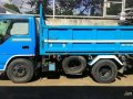 Isuzu Giga Mini Dump 2004 MT Blue For Sale -0