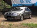 Manual tranny 2004 Chevrolet Optra all power elegant interior for sale-0