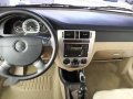 Manual tranny 2004 Chevrolet Optra all power elegant interior for sale-3
